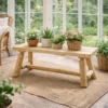 petit banc de jardin en bois rondins massif blanc rustique plante